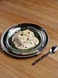Pistachio cream in a silver dish