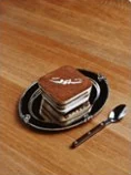 A square of tiramisu marked with the Shalwa falcon