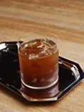 An iced americano in a tall glass
