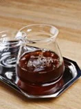 Cold brew over ice in a glass carafe