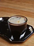 A cappuccino with a deep layer of foam